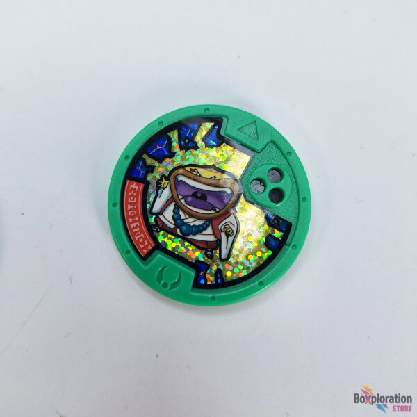 Yo‑kai Watch – Demuncher Medal (Z/green holo)