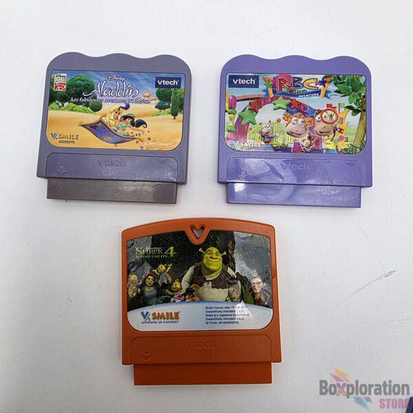 Lot of 3 VTech V.Smile Game Cartridges (French) - Aladdin, ABC Land Aventure, Shrek Forever After